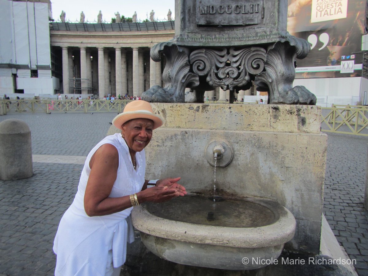 Alice splashing holy water
